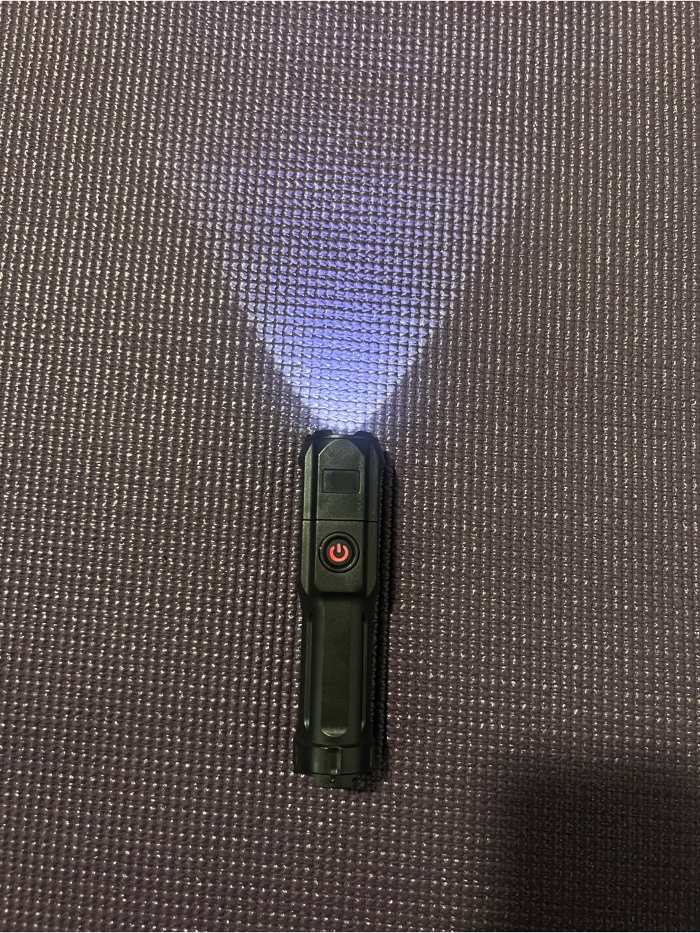 Compact Black LED Flashlight with Single-Button Control - Picture 1 of 5
